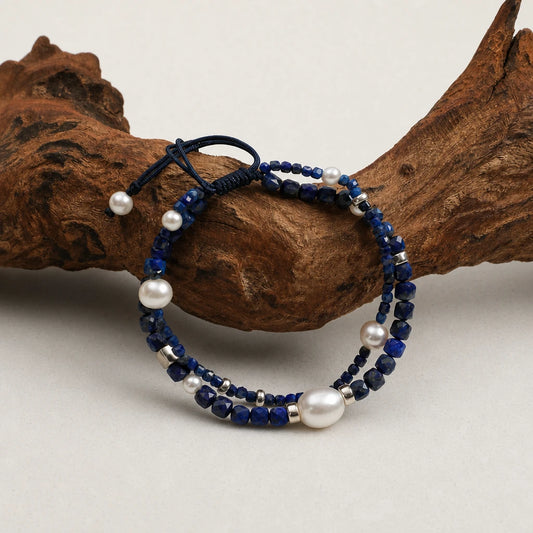 Close-up of lapis lazuli and pearl double layer bracelet