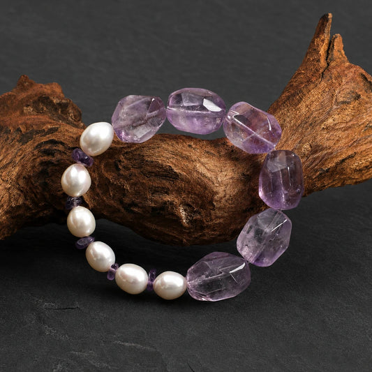 Styled view of amethyst and freshwater pearl bracelet