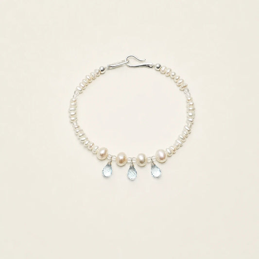 Flat pearl, egg pearl and blue topaz bracelet product image