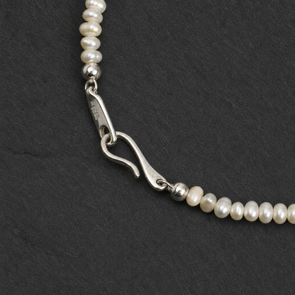 Flat Pearl, Egg Pearl & Blue Topaz Bracelet